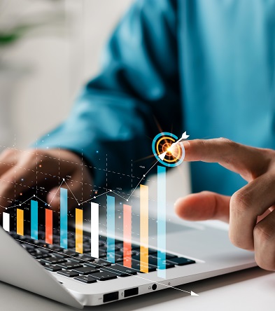 Finger pointing to target on rising bar chart overlay